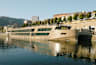 Exterior view of Estrela, a Travelmarvel ship, sailing on a river