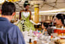 Princess Tiana with guests on Disney ship at Royal tea