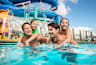 Family in a pool onboard Norwegian Encore