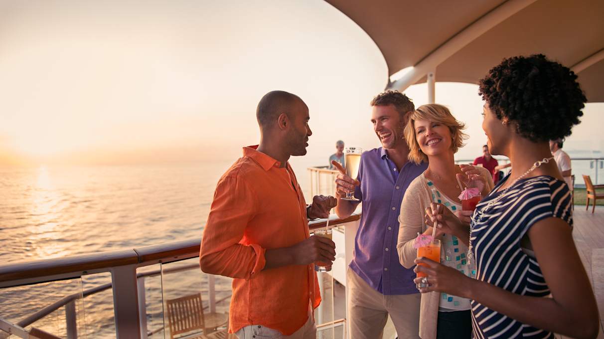 Friends enjoying drinks on a Celebrity Cruises