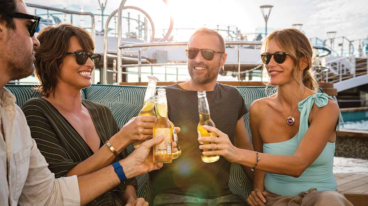 Friends having drinks by the Sky Pool
